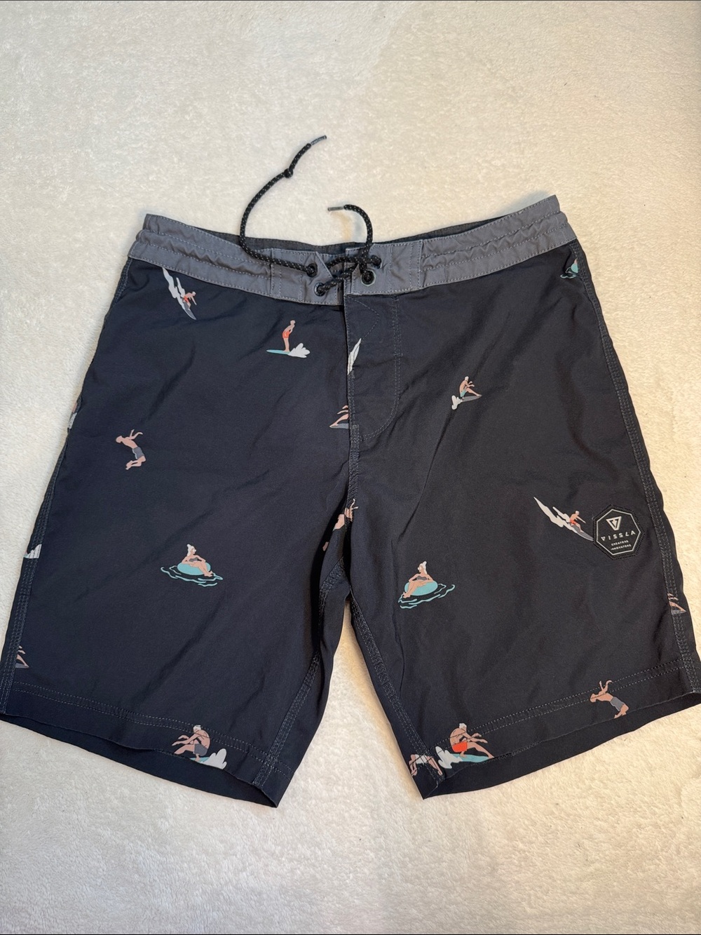 Vissla black patterned board shorts. 30.